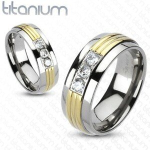 Titánium gyűrű - arany színű középső sáv, áttetsző cirkóniák - Nagyság: 49